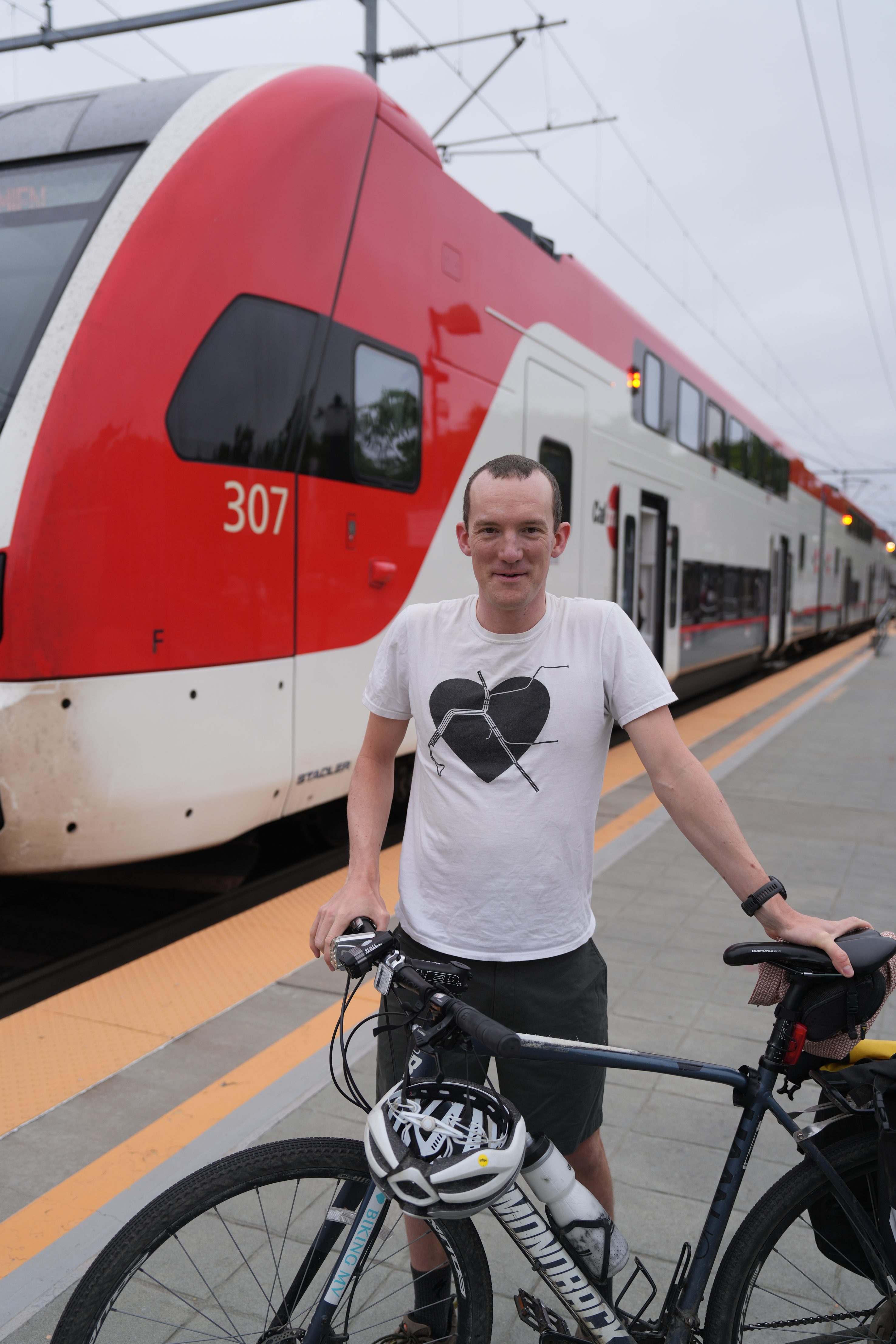 James Kuszmaul standing on a transit platform